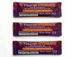 Three packages of Flourish Hydrate electrolyte drink mix on a white background